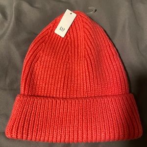 A pink beanie